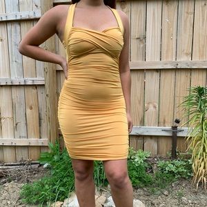 Mustard yellow fashion nova dress.